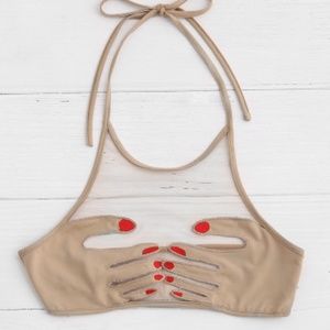 Hand holding Bra